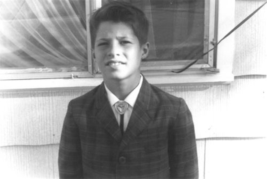 Black and white photo of young Mike Coffman, age 9