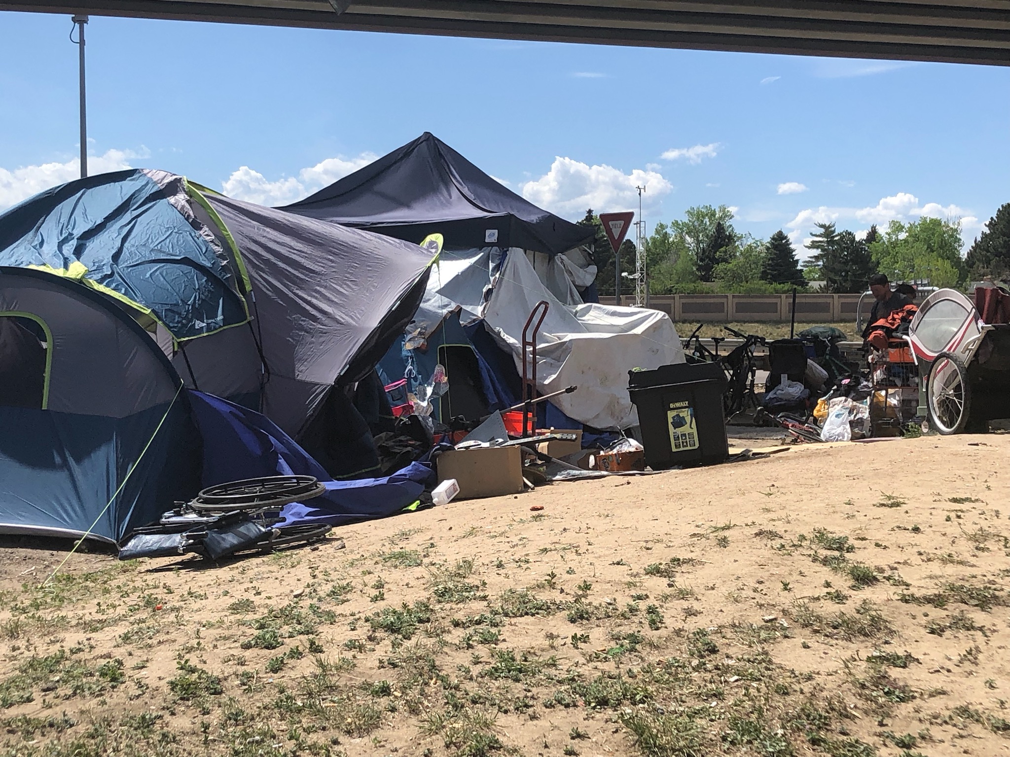 Homeless tent encampment outside during the day